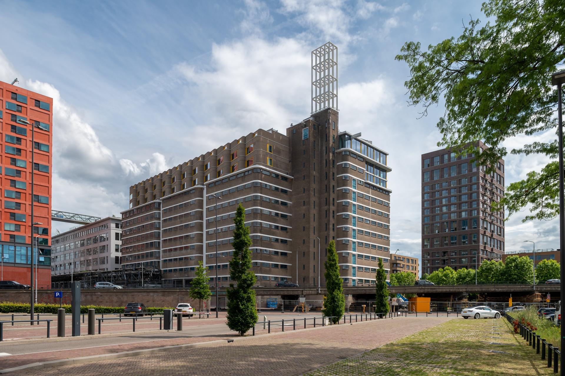 Veemgebouw met optopwoningen