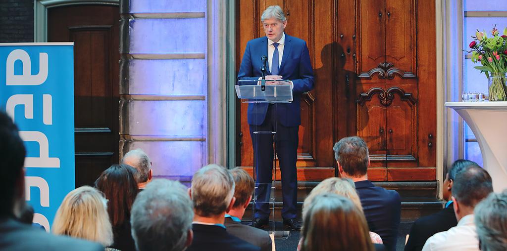 Martin van Rijn tijdens Waarde van Wonen-lezing 2023